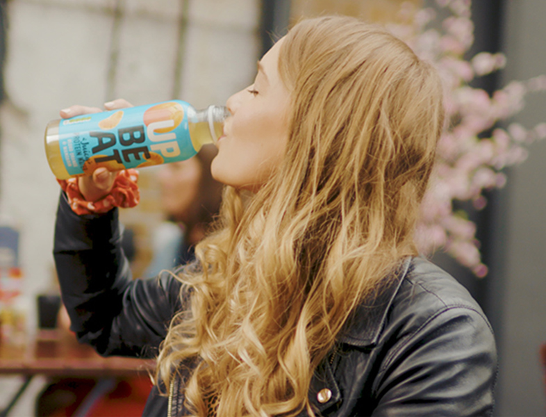 Girl drinking upbeat water