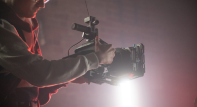 man with video camera
