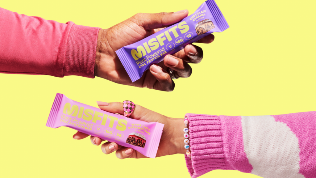 Two hands holding Misfits bars